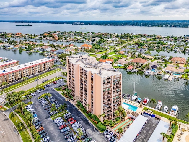 birds eye view of property featuring a water view