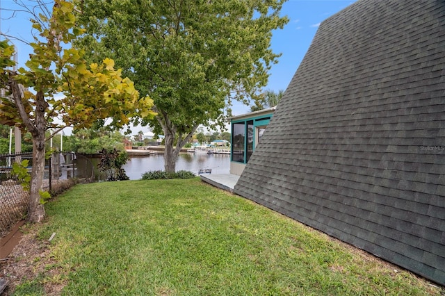 view of yard with a water view