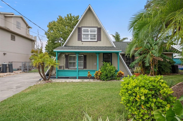 view of front of house featuring a front lawn and a porch