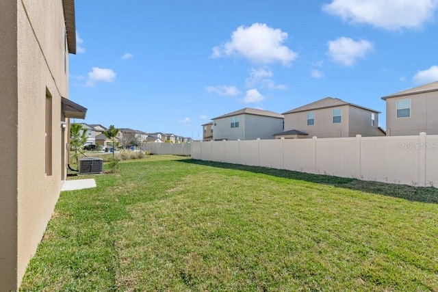 view of yard featuring central AC