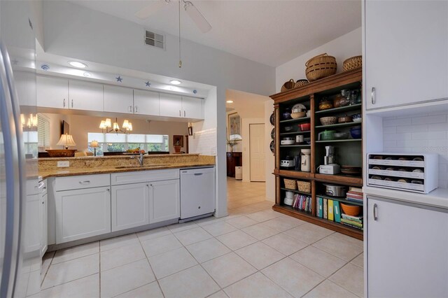 kitchen with dishwasher, white cabinetry, sink, light tile patterned flooring, and ceiling fan