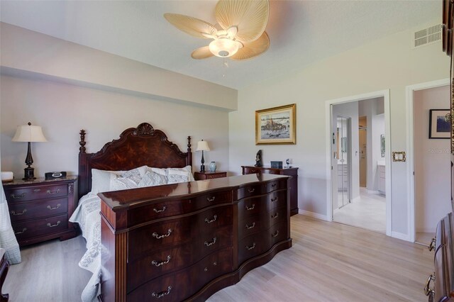 bedroom with ceiling fan and light hardwood / wood-style floors