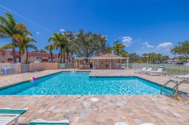 view of pool featuring a patio area