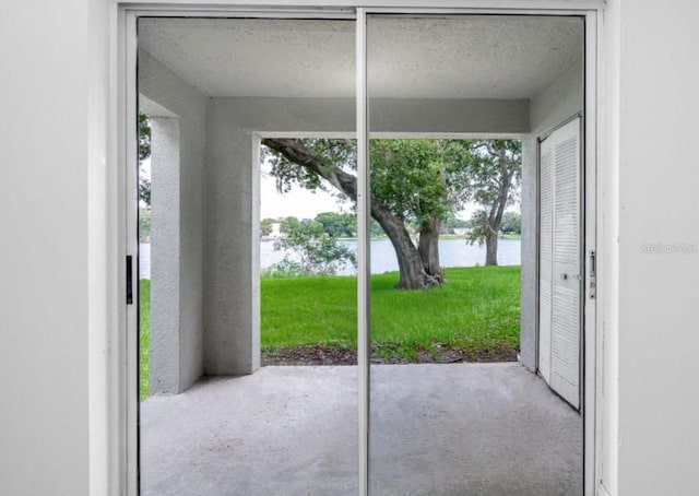 doorway featuring a water view