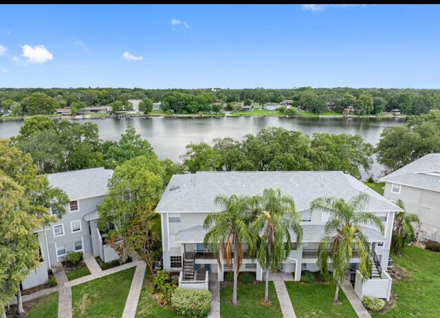 birds eye view of property featuring a water view