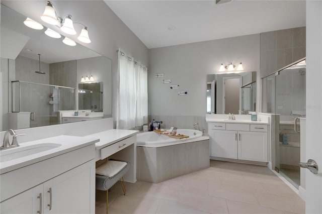 bathroom featuring plus walk in shower, tile patterned flooring, and vanity