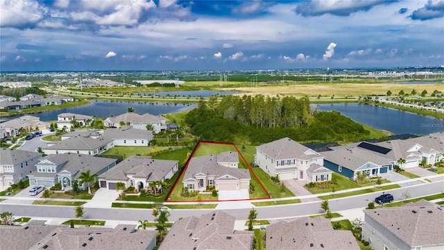 aerial view featuring a water view