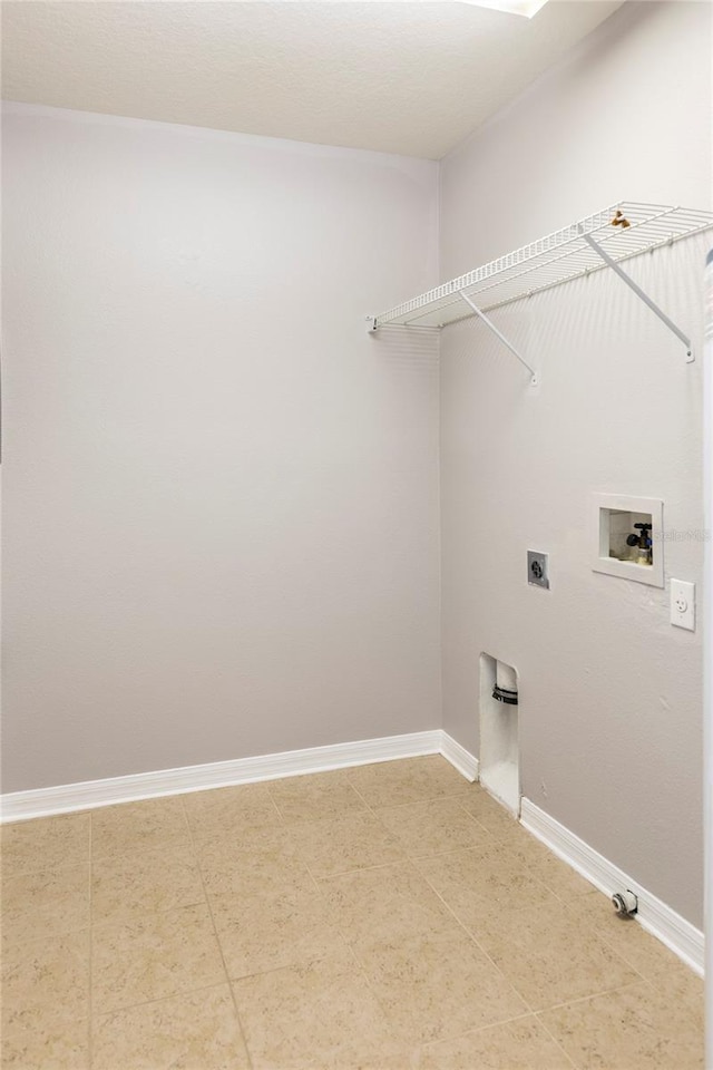 clothes washing area with hookup for a washing machine and electric dryer hookup