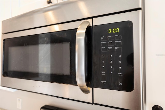 interior details featuring white cabinets