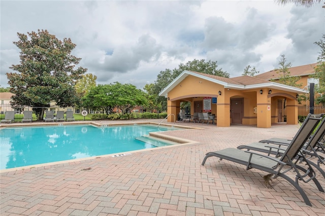 view of pool with a patio area