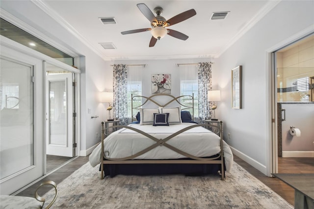 bedroom featuring ornamental molding, dark hardwood / wood-style flooring, and ceiling fan