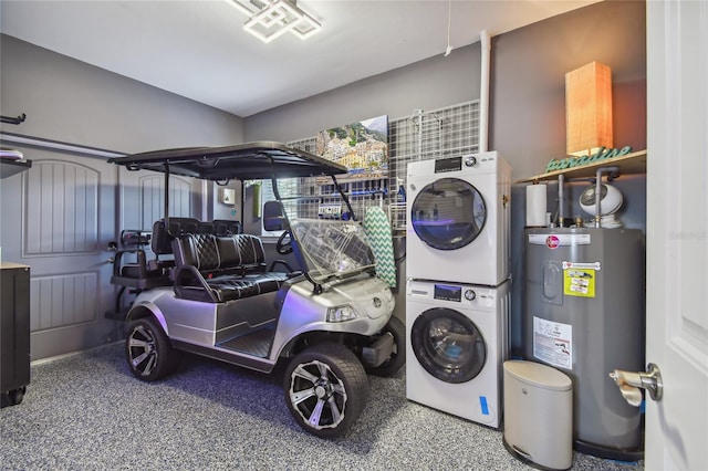 garage with electric water heater and stacked washing maching and dryer