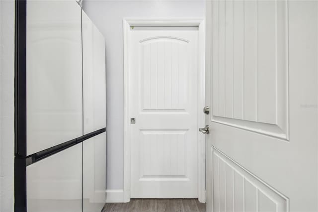 doorway to outside featuring light wood-type flooring