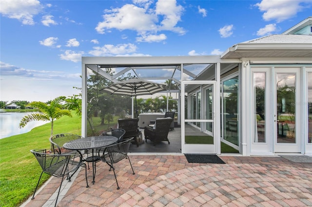 view of patio / terrace with a water view