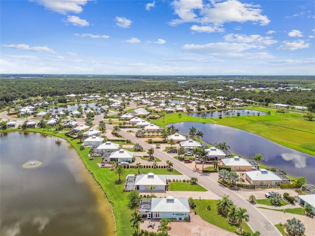 drone / aerial view featuring a water view