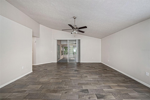 unfurnished room with ceiling fan, a textured ceiling, and vaulted ceiling