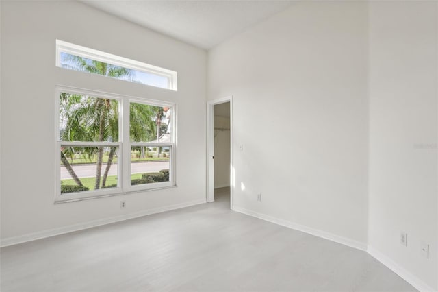 empty room with light hardwood / wood-style floors