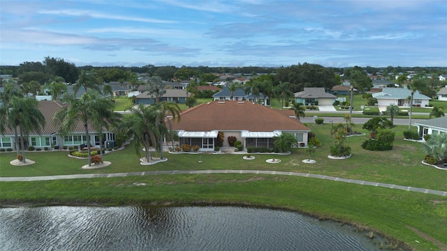 drone / aerial view with a water view