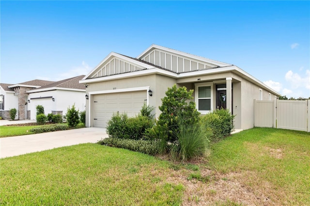 exterior space with a garage and a lawn