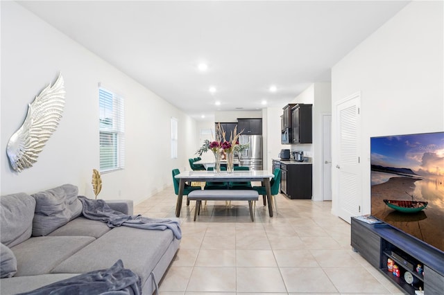 living room with light tile patterned flooring