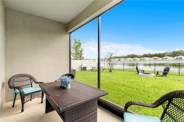 sunroom with a water view