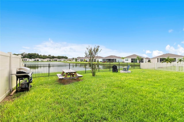 view of yard featuring a water view