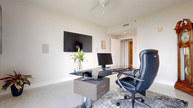 office with light tile patterned flooring and ceiling fan