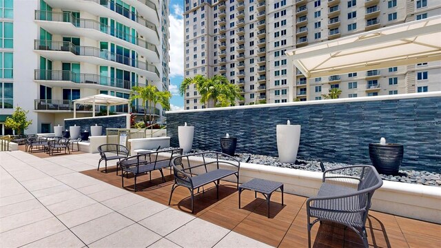 view of patio / terrace featuring a balcony and an outdoor hangout area