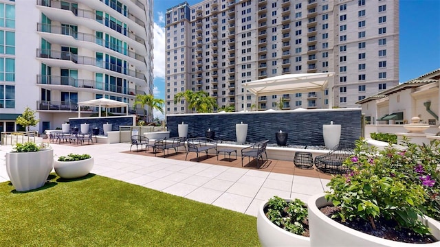 view of patio with a balcony