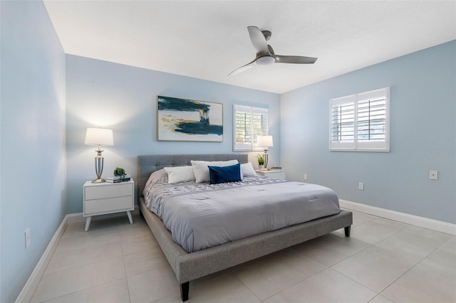 tiled bedroom with ceiling fan