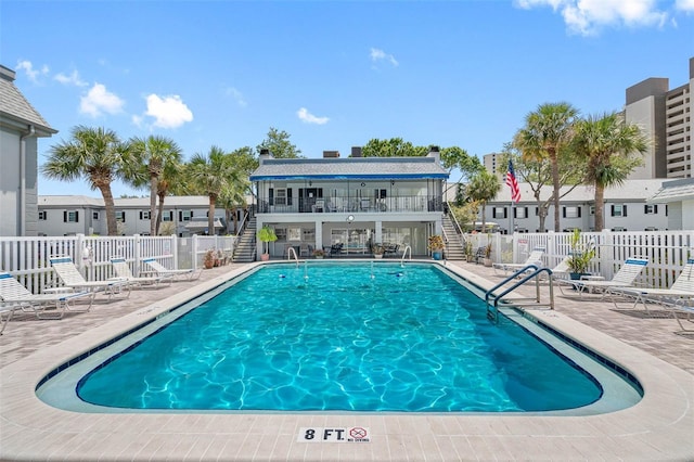 view of pool featuring a patio area