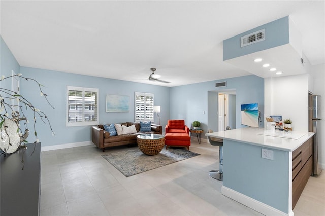 living room featuring ceiling fan