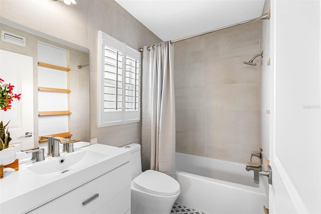 full bath with visible vents, shower / bathtub combination with curtain, toilet, and vanity