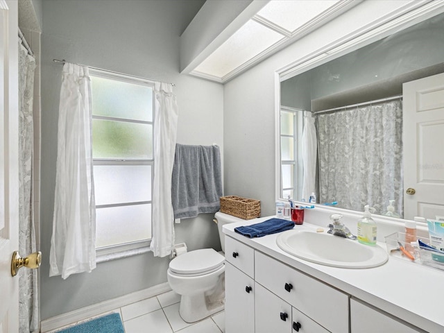 bathroom with tile patterned floors, vanity, and toilet