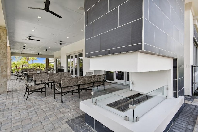 view of patio / terrace featuring ceiling fan