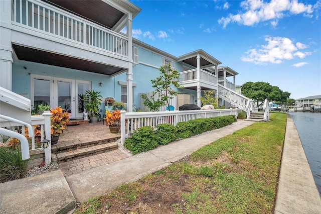 surrounding community featuring a water view