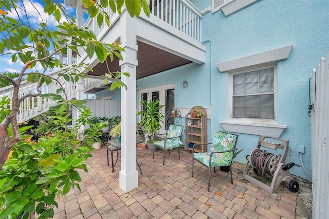 view of patio with a balcony