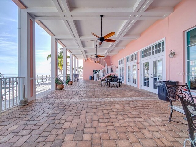 view of patio / terrace with ceiling fan and french doors