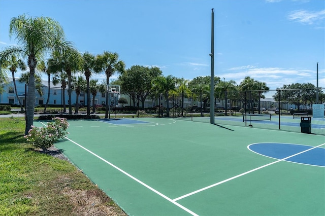 view of basketball court featuring tennis court