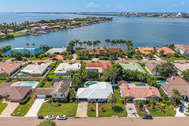 bird's eye view with a water view