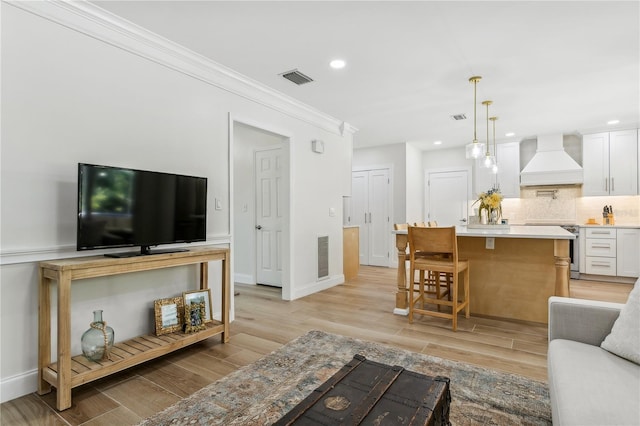 living room with crown molding