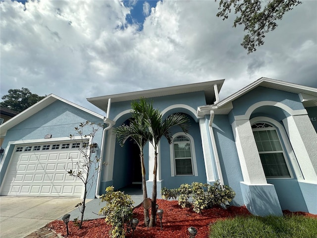 view of front of home with a garage