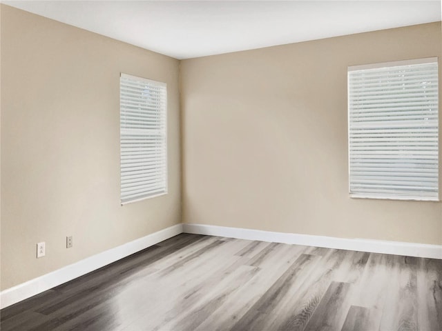 empty room featuring hardwood / wood-style floors