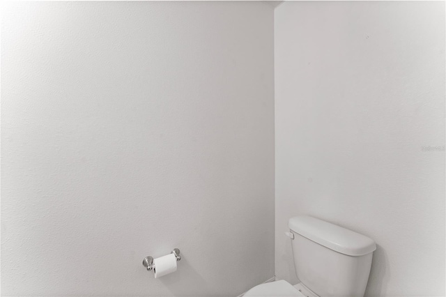 bathroom featuring toilet