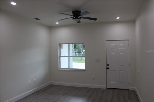 entryway featuring ceiling fan and dark hardwood / wood-style flooring