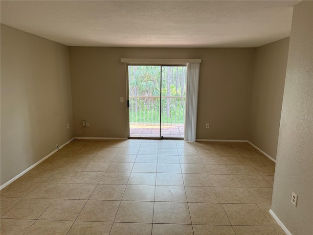 view of tiled empty room