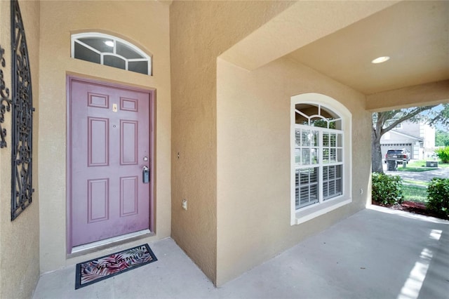 12739 Standbridge Dr, Riverview, FL 33579 - view of exterior entry featuring stucco siding and a porch