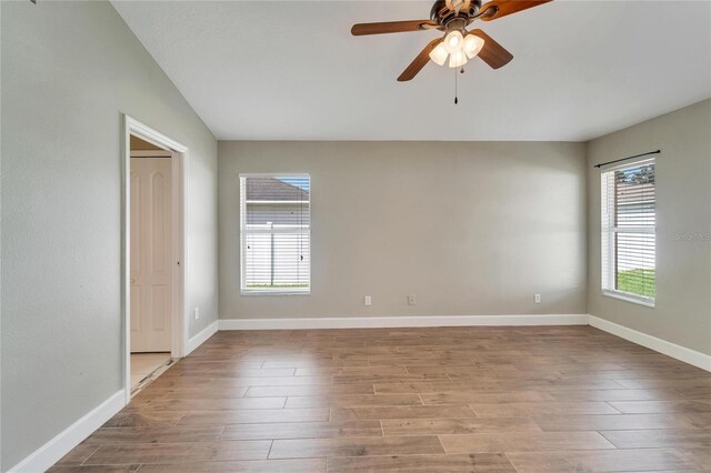 12739 Standbridge Dr, Riverview, FL 33579 - spare room featuring wood finished floors, ceiling fan, and baseboards