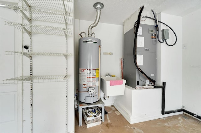12739 Standbridge Dr, Riverview, FL 33579 - utility room featuring gas water heater and a sink