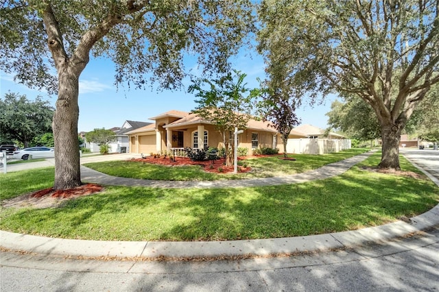12739 Standbridge Dr, Riverview, FL 33579 - view of front of house with a garage, stucco siding, and concrete driveway